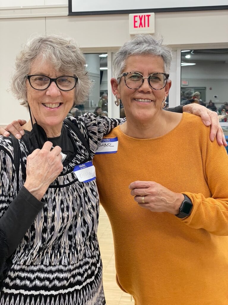 Two women standing together